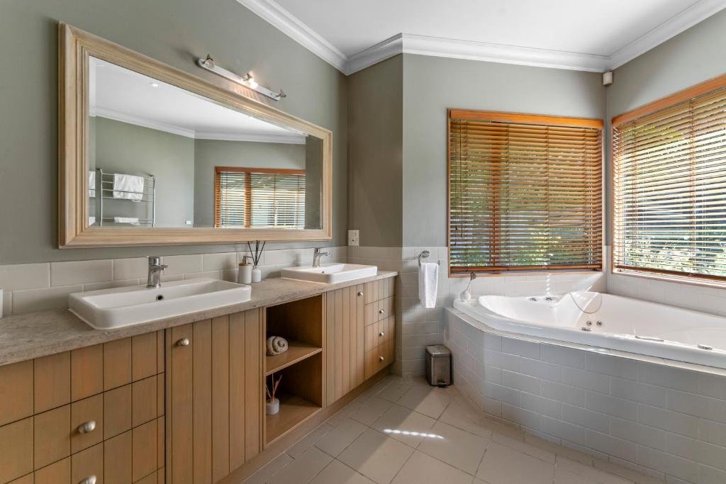 Bathroom with twin basins and spa bath